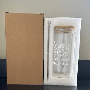 Glass tumbler with bamboo lid and glass straw